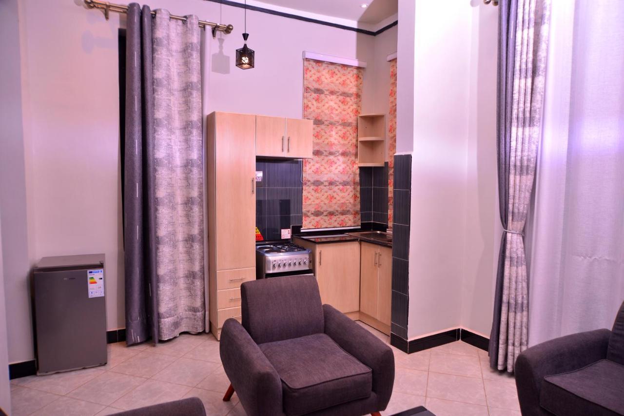 Hilltop Apartments Bwebajja Екстер'єр фото